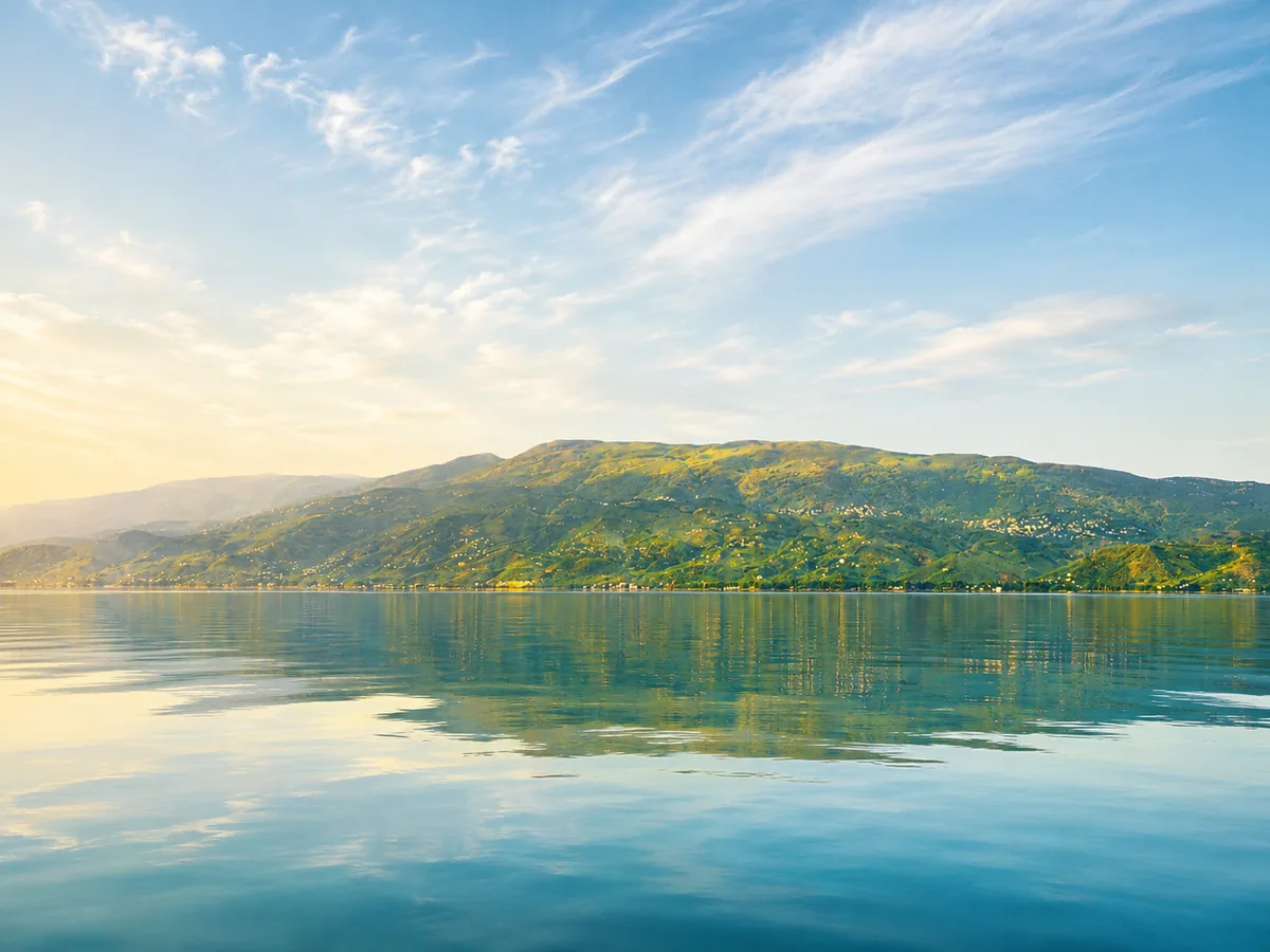 Pelion mountains reflected in calm water